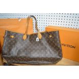 A Louis Vuitton tote bag in brown monogram print with tan leather trim, original box and bag [