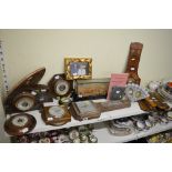 Approximately nine wooden wall barometers, a framed and glazed Oriental cork model of a house and