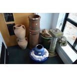 A garden lot comprising of a vintage chimney, two terracotta garden urns, a stoneware sundial and