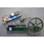 A table top steam engine and a small quantity of model vehicles [upstairs shelves] TO BID ON THIS