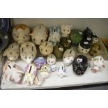A collection of piggy banks, approximately 23 in total. [s56] TO BID ON THIS LOT AND FOR VIEWING