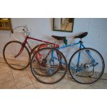 A red vintage Claude Butler racing bike plus another blue racing bike TO BID ON THIS LOT AND FOR