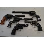 Five Japanese replica revolvers, all in black, comprising: Kokusai Ruger Super Black Hawk cal. 44