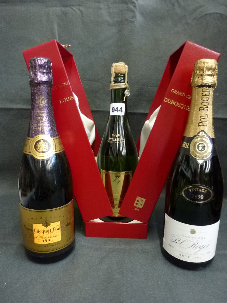 Three bottles of champagne: Louis Dubosquet Grand Cru, 1999 Millesime, bottle no. B1376; Pol Roger