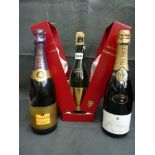 Three bottles of champagne: Louis Dubosquet Grand Cru, 1999 Millesime, bottle no. B1376; Pol Roger
