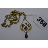 An Edwardian 9 ct gold pendant set with garnets and seed pearls, and a 9 ct chain necklace, 7.5 gm