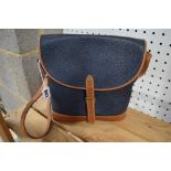 A Mulberry bucket bag in dark blue hide with tan leather trim [upstairs shelves] TO BID ON THIS