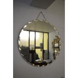 A 1930s circular mirror TO BID ON THIS LOT AND FOR VIEWING APPOINTMENTS CONTACT BAINBRIDGES. WE DO