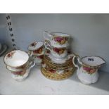 A 19-piece Royal Albert Old Country Roses tea service and a Royal Worcester blush vase decorated