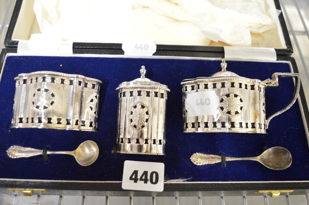 An impressive Elizabeth II silver condiment set in case, of large size, with pierced decoration,