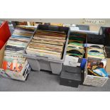 Two boxes of 12 in records covering a wide range, from Elvis to Fischer-Z, from film themes to