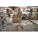 An Elizabeth II silver three-light candelabrum, with detachable branches and filled base, 9.75 in,