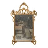 MIRROR IN GILDED WOOD 29TH CENTURY