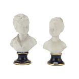 PAIR OF SMALL BISCUIT BUSTS 20TH CENTURY LIMOGES