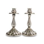 A PAIR OF CANDLESTICKS IN SILVER - PUNCH ALEXANDRIA 1944/1968