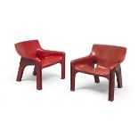 APAIR OF RED PLASTIC ARMCHAIRS DESIGN VICO MAGISTRETTI FOR ARTEMIDE 1980s