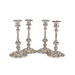 FOUR SILVER-PLATED CANDLESTICKS PUNCH SHEFFIELD 19TH CENTURY