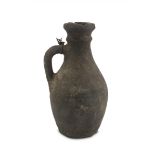 A PERSIAN EARTHERNWARE PITCHER 2ND CENTURY B.C. - 2ND CENTURY A.C.