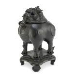 A CHINESE BRONZE CENSER SHAPED AS GUARDIAN LION. 19TH CENTURY.