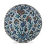 A PERSIAN CERAMIC DISH 19T CENTURY.