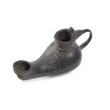 A PERSIAN BRONZE OIL LAMP 17TH CENTURY. LACK.