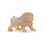 A SMALL CHINESE CHALCEDONY GUARDIAN LION SCULPTURE 20TH CENTURY.