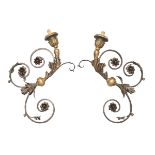 A PAIR OF LARGE WALL ARMS IN WROUGHT IRON, 19TH CENTURY