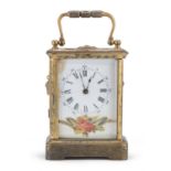 MIGNON TABLE CLOCK IN BRASS AND ENAMELS EARLY 20TH CENTURY