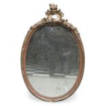 OVAL MIRROR IN GILTWOOD LATE BAROQUE PERIOD