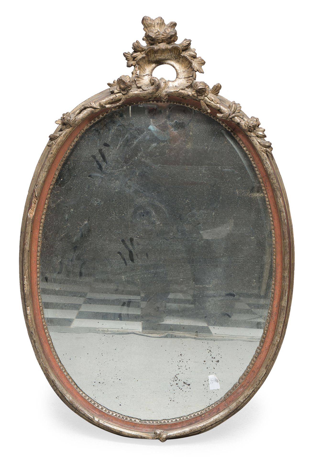 OVAL MIRROR IN GILTWOOD LATE BAROQUE PERIOD