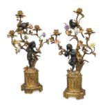 PAIR OF GILT BRONZE CANDLESTICKS WITH PORCELAIN EARLY 19TH CENTURY