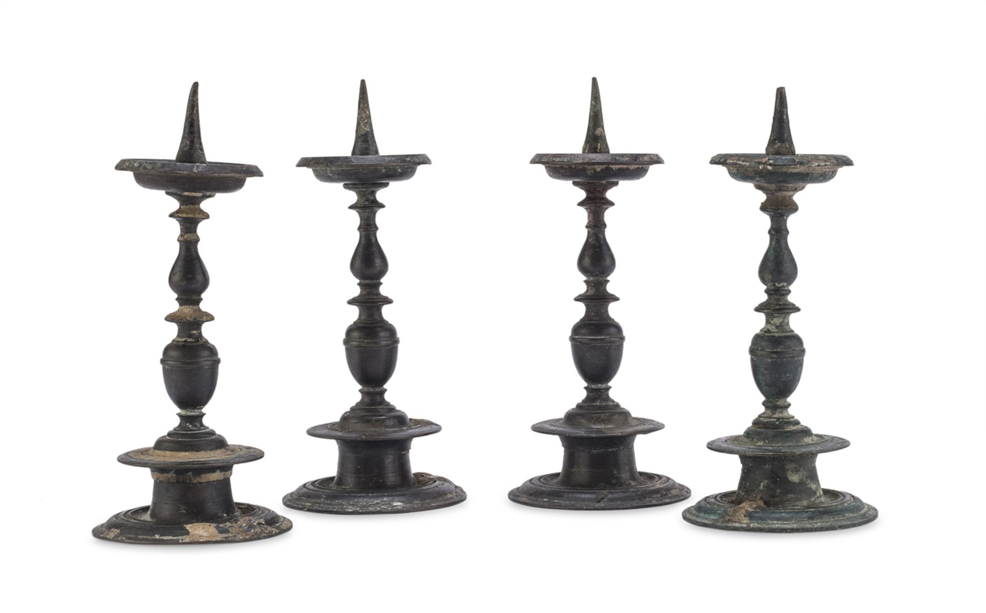 FOUR MIGNON CANDLESTICKS IN BRONZE 18TH CENTURY