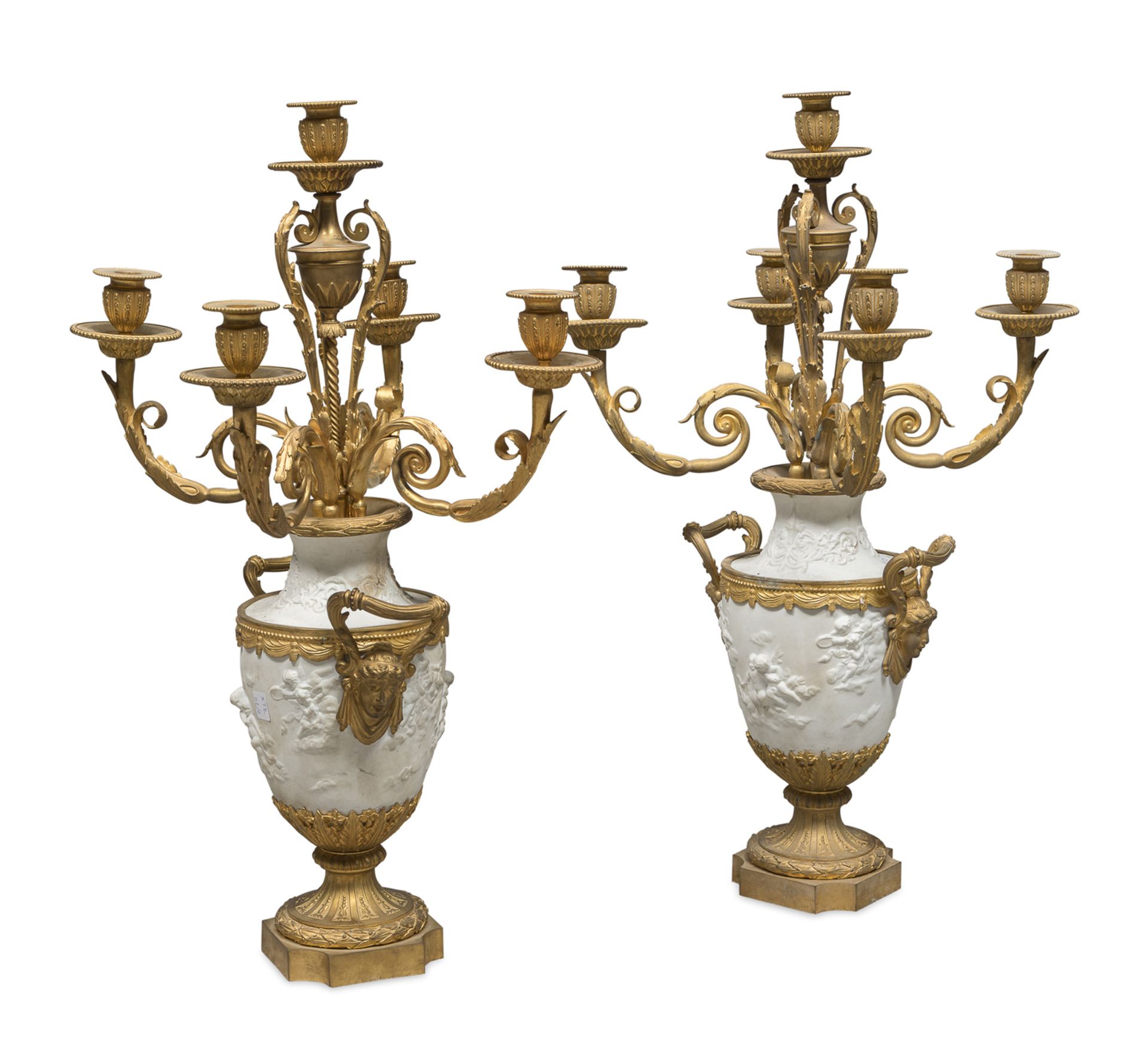 PAIR OF CANDLESTICKS IN BISCUIT AND GILT BRONZE EARLY 19TH CENTURY