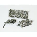 SILVER BROOCHES.