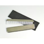 CASED COMB.