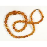 AMBER BEADS.