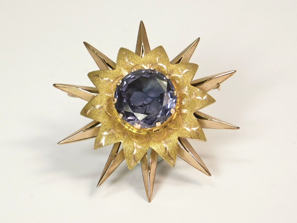 STAR BURST BROOCH.