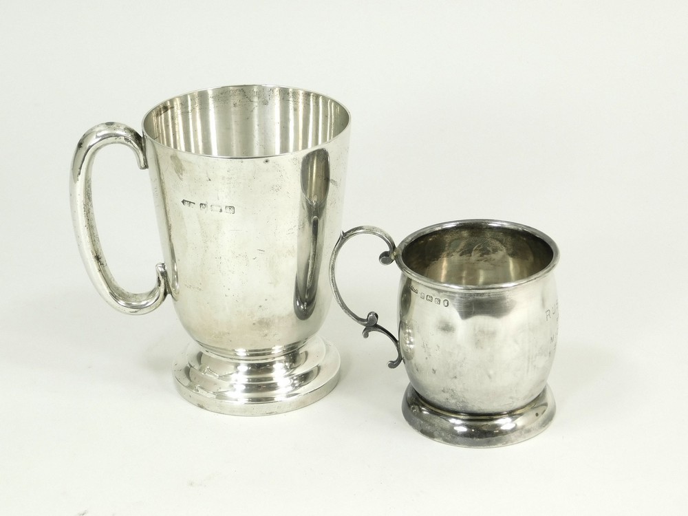 SILVER MUGS.