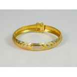 GOLD BANGLE.