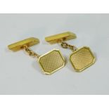 GOLD CUFFLINKS.