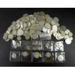 A collection of George V and George VI silver coins, 1920-1946, including 38 half crowns, 44