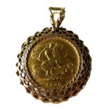 An Edward VII gold half sovereign, 1908, in 9ct gold pendant mount, 6.7g.