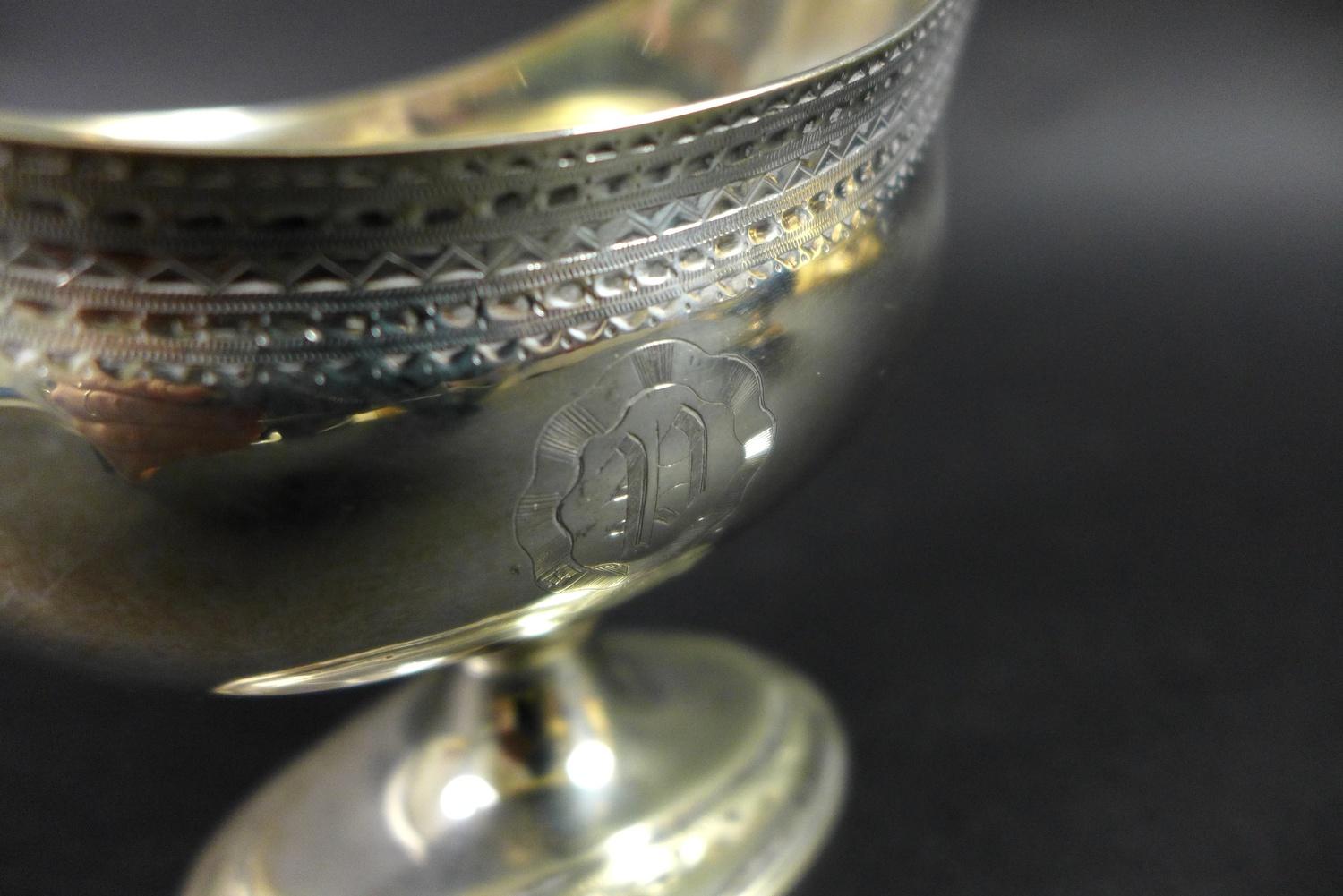 A pair of George III silver pedestal sauce boats, with bright cut decoration and engraved with the - Image 4 of 9