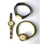 A group of three 9ct gold cased lady's wristwatches, comprising a Tudor Royal, with circular dial,