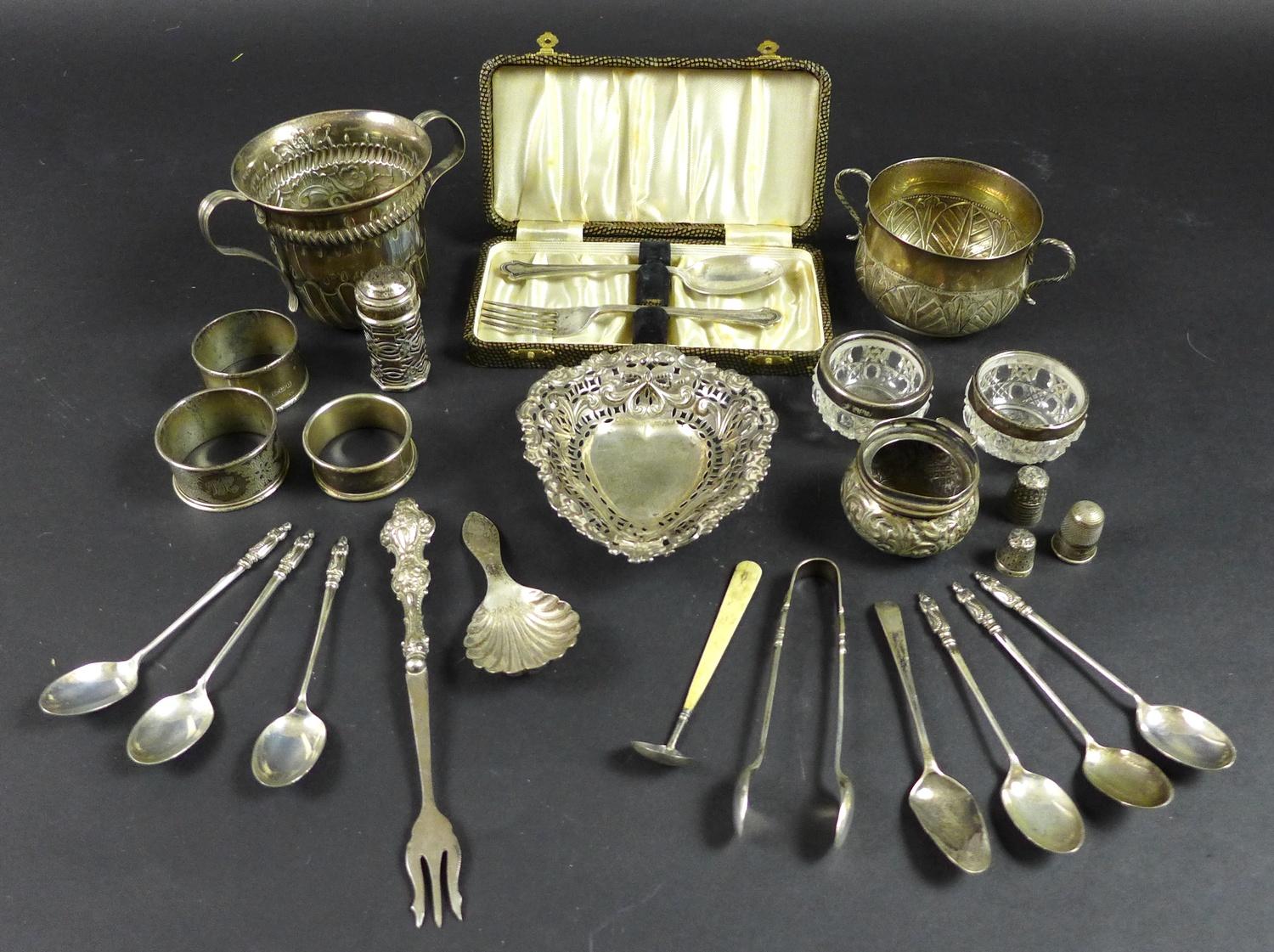 A group of silver items, including a Victorian twin handled Christening cup with gadrooned