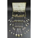 A collection of forty seven Danish silver teaspoons, includiing an early 20th century cased set of