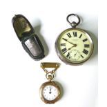 A 9ct gold cased top wind fob watch with Arabic dial, inscribed gilt dust cover, and gilt pin