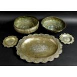 A group of South East Asian white metal, comprising oval tray, 33.5 by 25.5cm, a pair of circular