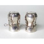 A pair of contemporary silver novelty salt and pepper pots, modelled as champagne corks, AD,