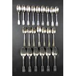 A collection of twenty three Victorian silver spoons, comprising six dessert spoons, Henry